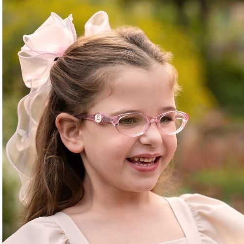 Little girl wearing sweet pink glasses