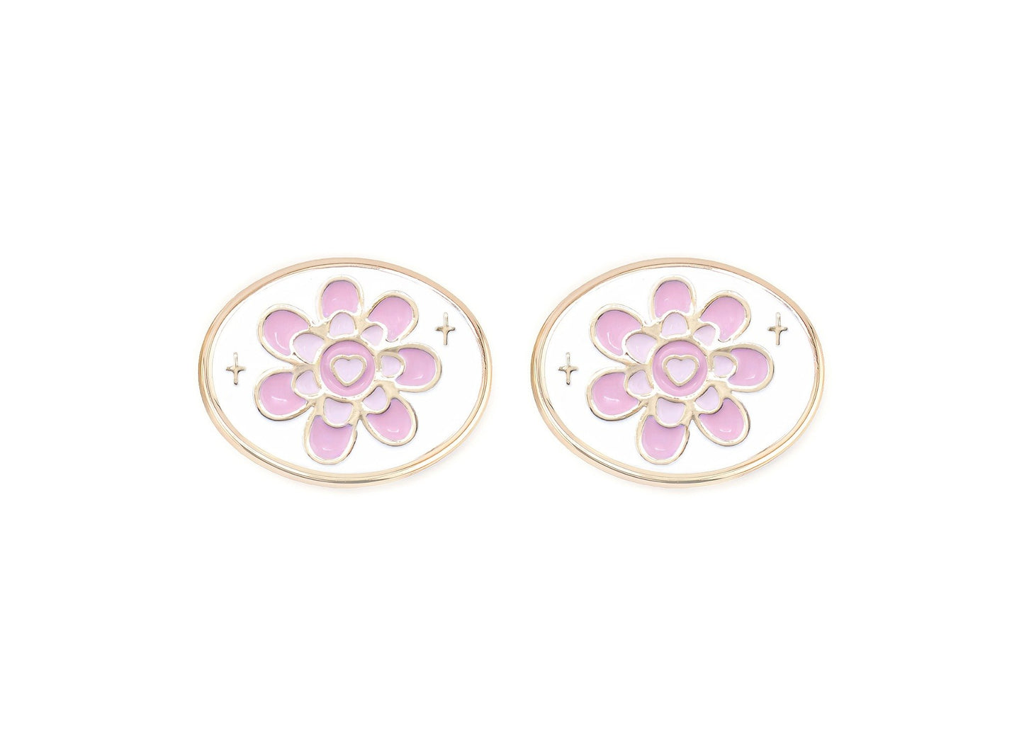 Pair of floral earrings with pink centers and gold accents on a white background