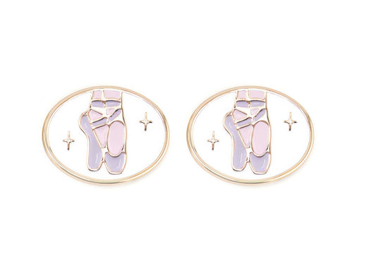 Pair of charms for girls eyeglasses with purple ballet shoes design on a white background