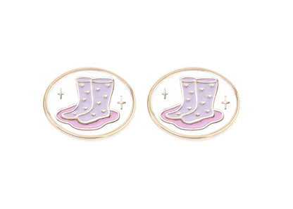 Pair of charms for girls eyeglasses with pink and purple rainboots design on a white background