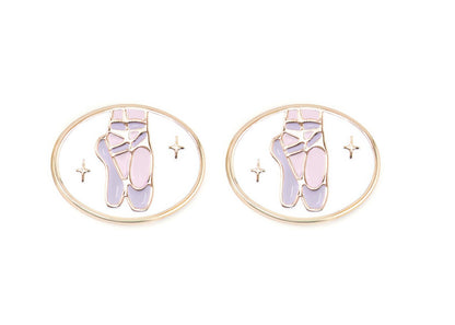 Pair of charms for girls eyeglasses with purple ballet shoes design on a white background