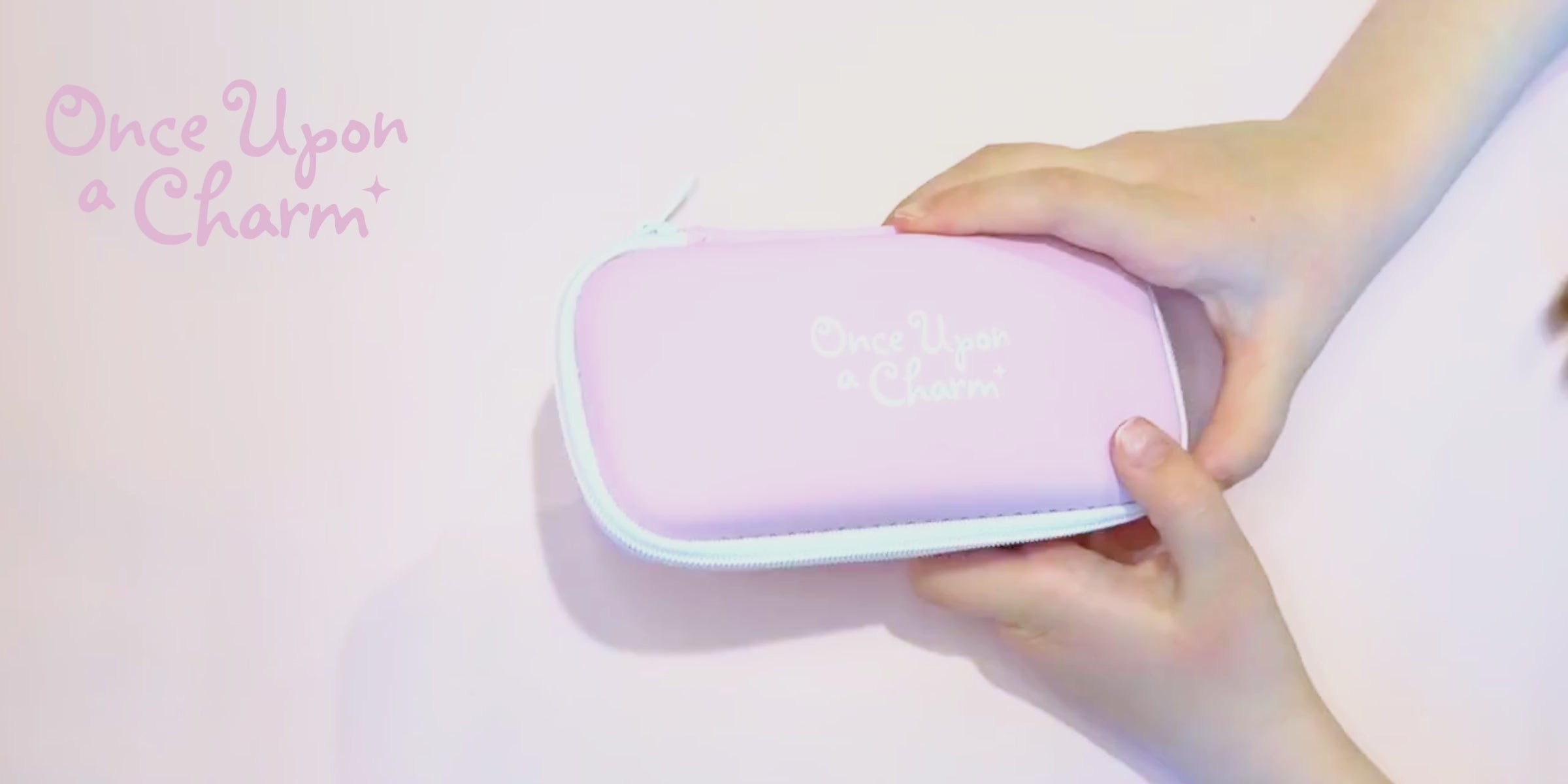 Load video: Video of a girl snapping the charms in and out with ease